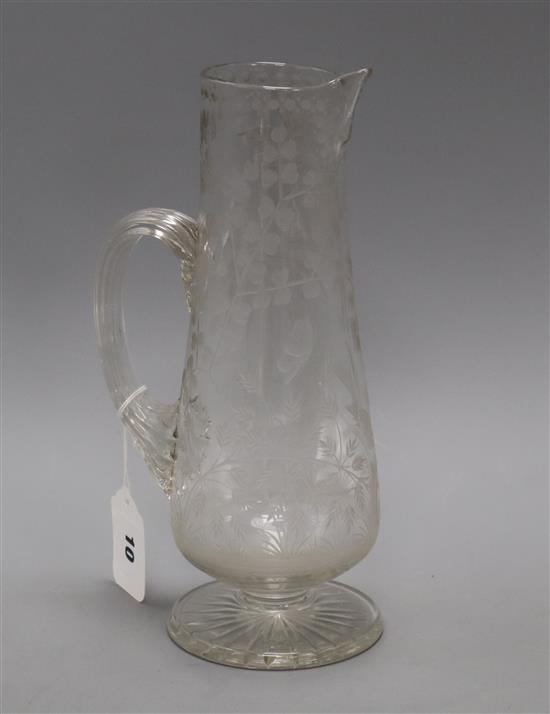 An etched cut glass ewer height 27.5cm